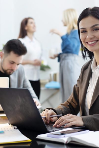 medium-shot-woman-working-laptop